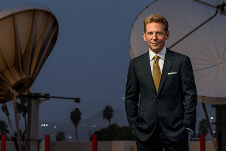 David Miscavige in Hollywood, California, satellites in background