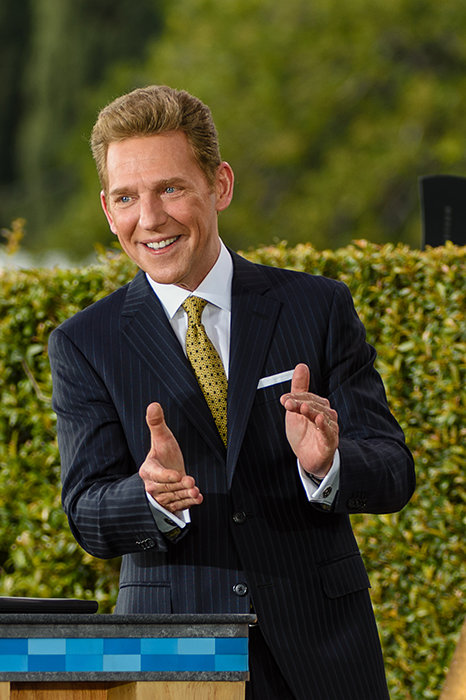 David Miscavige in North Hollywood, California, clapping at podium